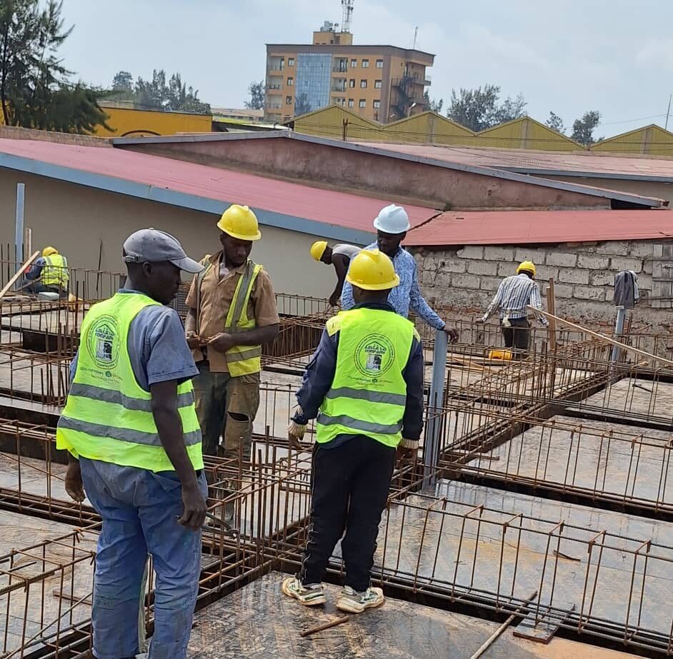 Construction team preparing foundation reinforcement in Kigali