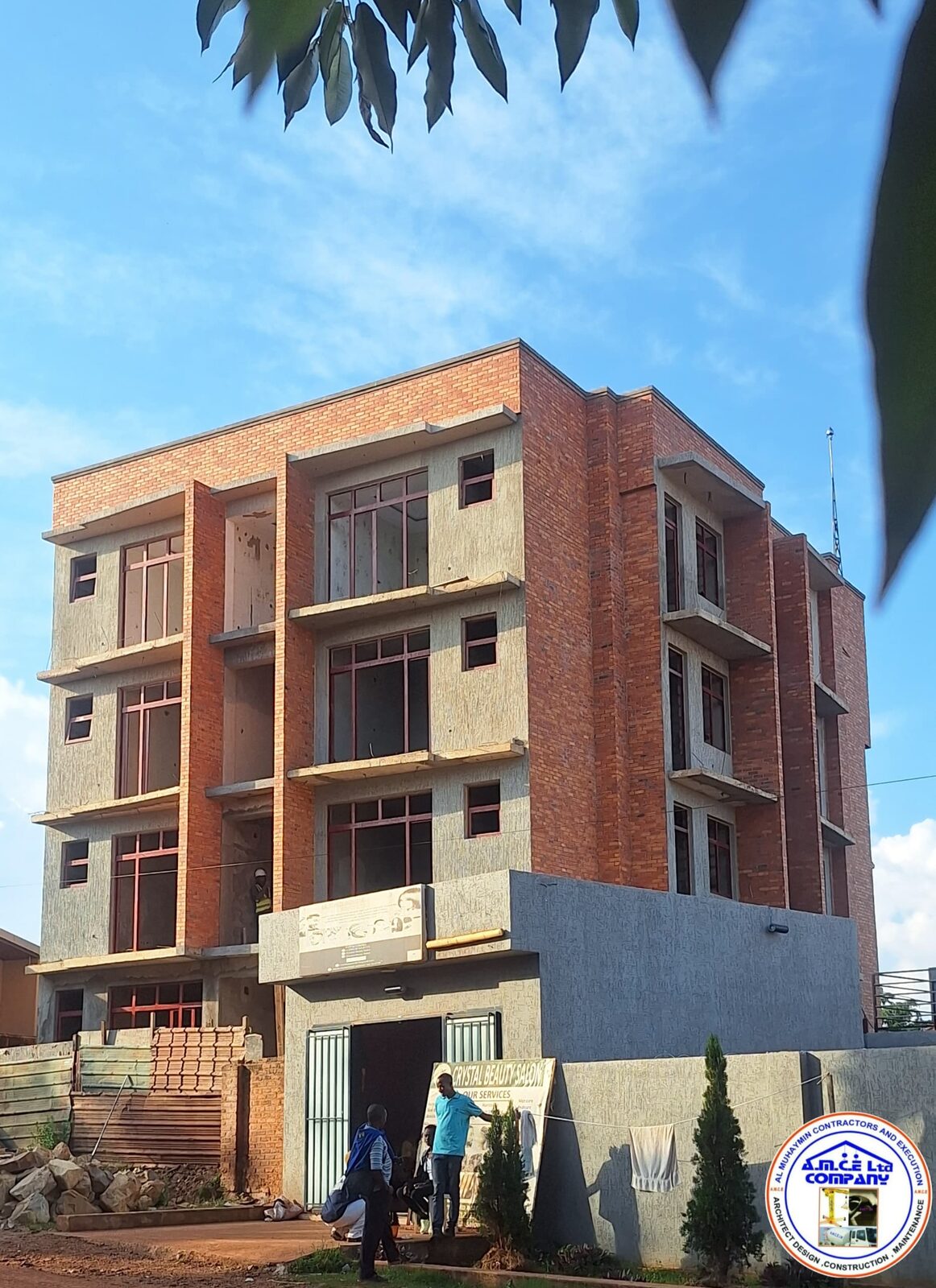 Multi-storey brick building near completion