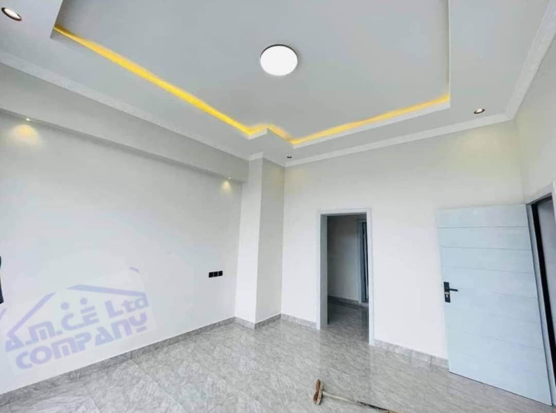 Finished room interior with modern ceiling lighting design